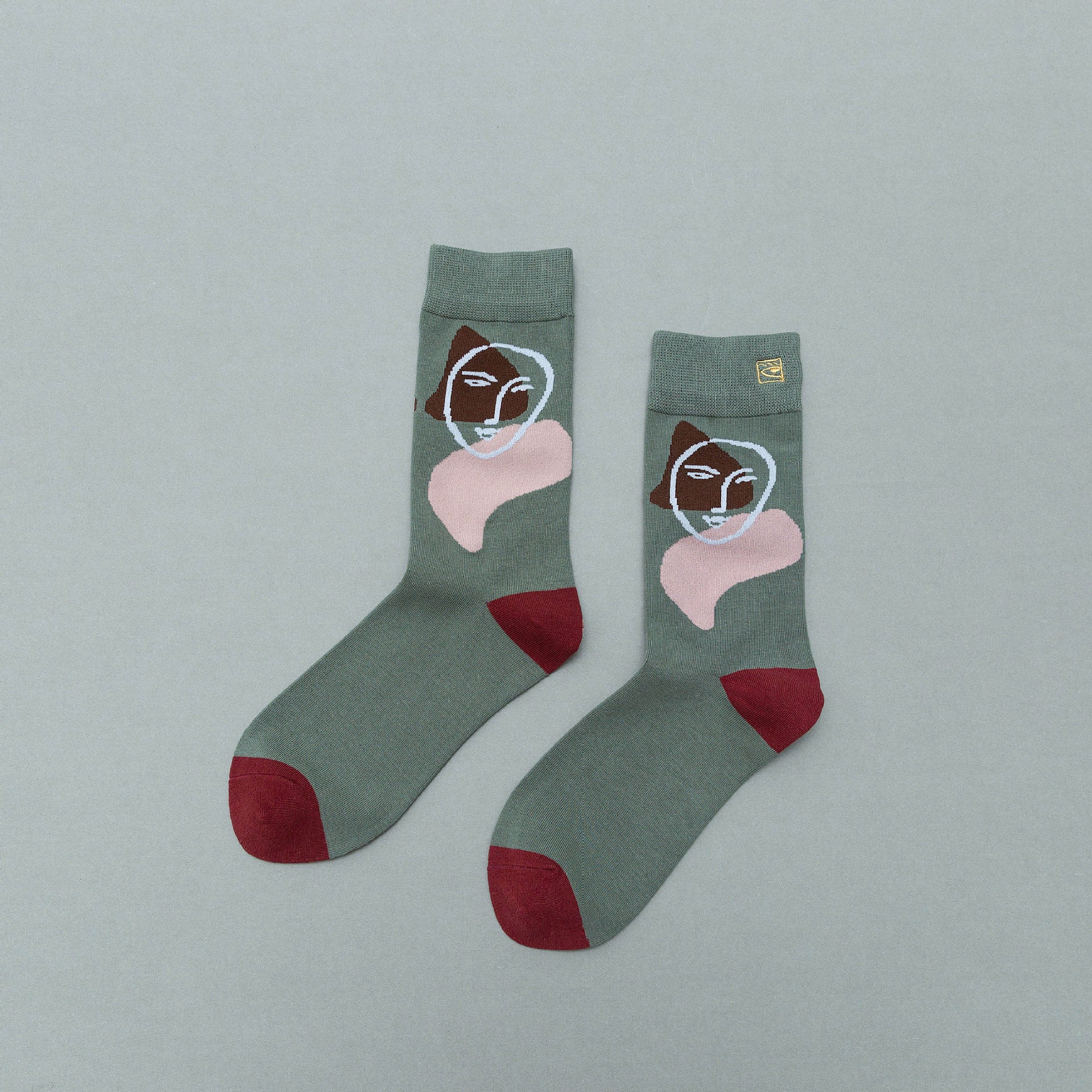 Personality contrast color graffiti character in tube socks Street style fashion cotton socks Limorista