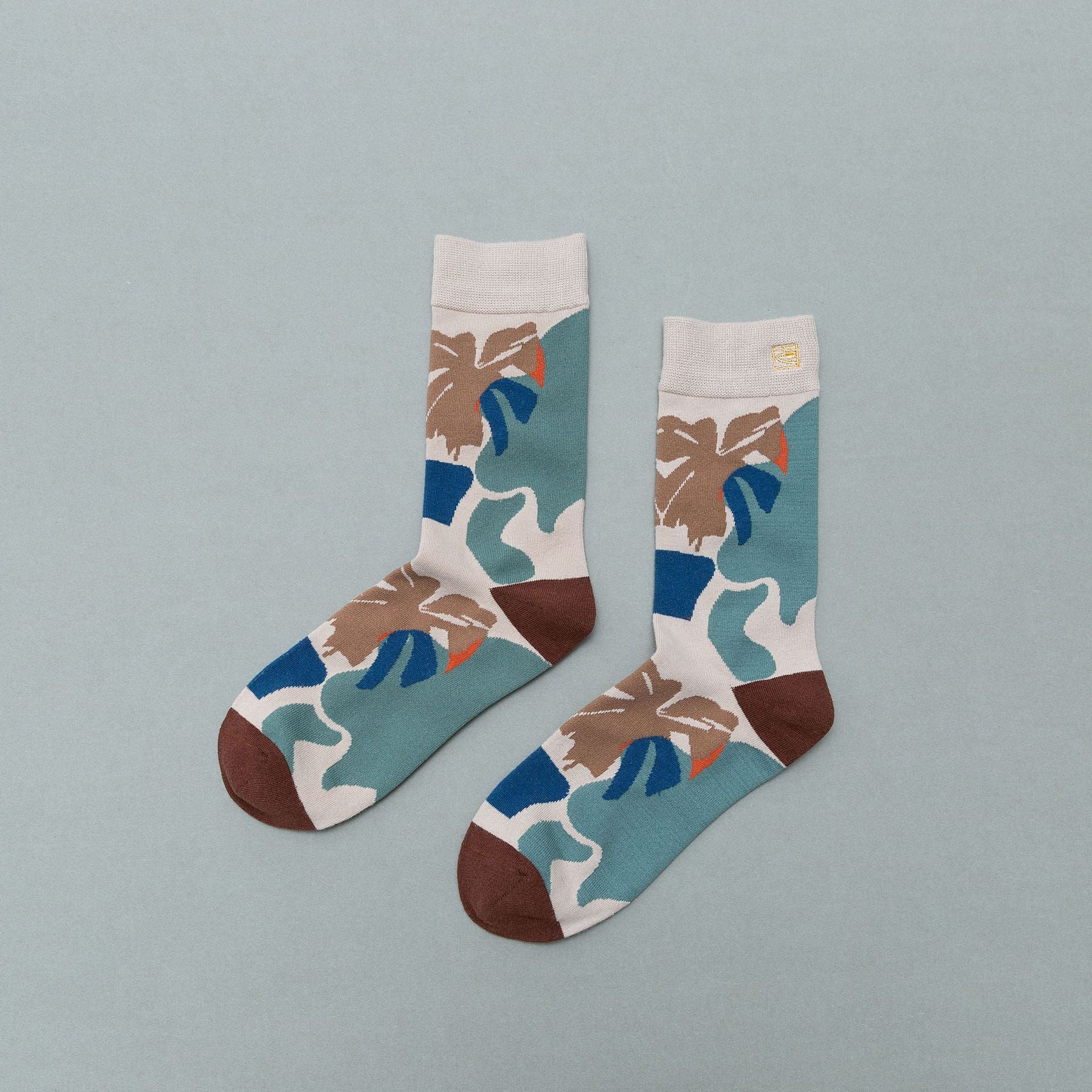 Personality contrast color graffiti character in tube socks Street style fashion cotton socks Limorista
