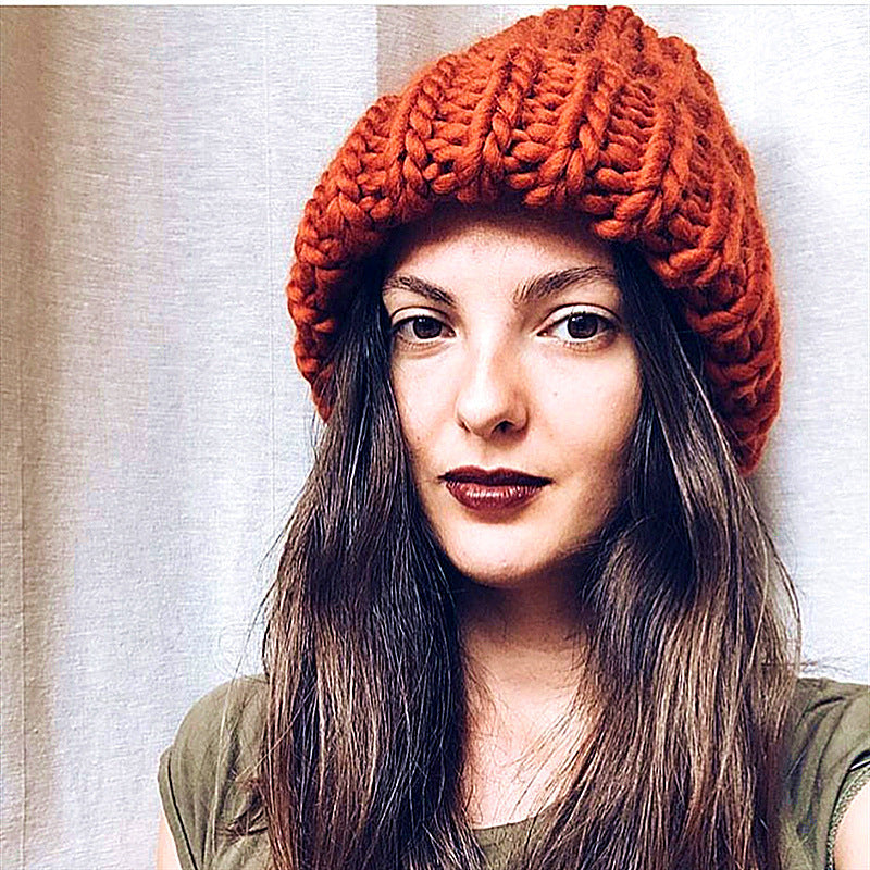 Europe and the United States new knit hat ladies autumn and winter fashion wild thick wool hat solid color simple earmuffs Limorista