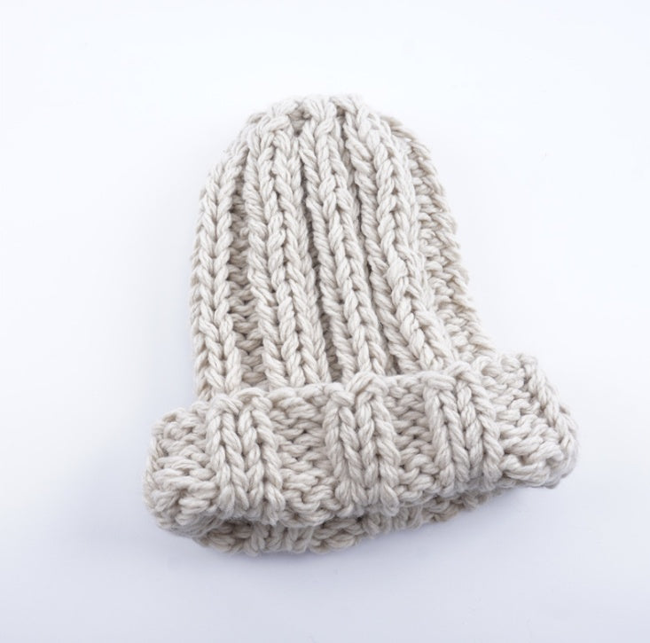 Europe and the United States new knit hat ladies autumn and winter fashion wild thick wool hat solid color simple earmuffs Limorista