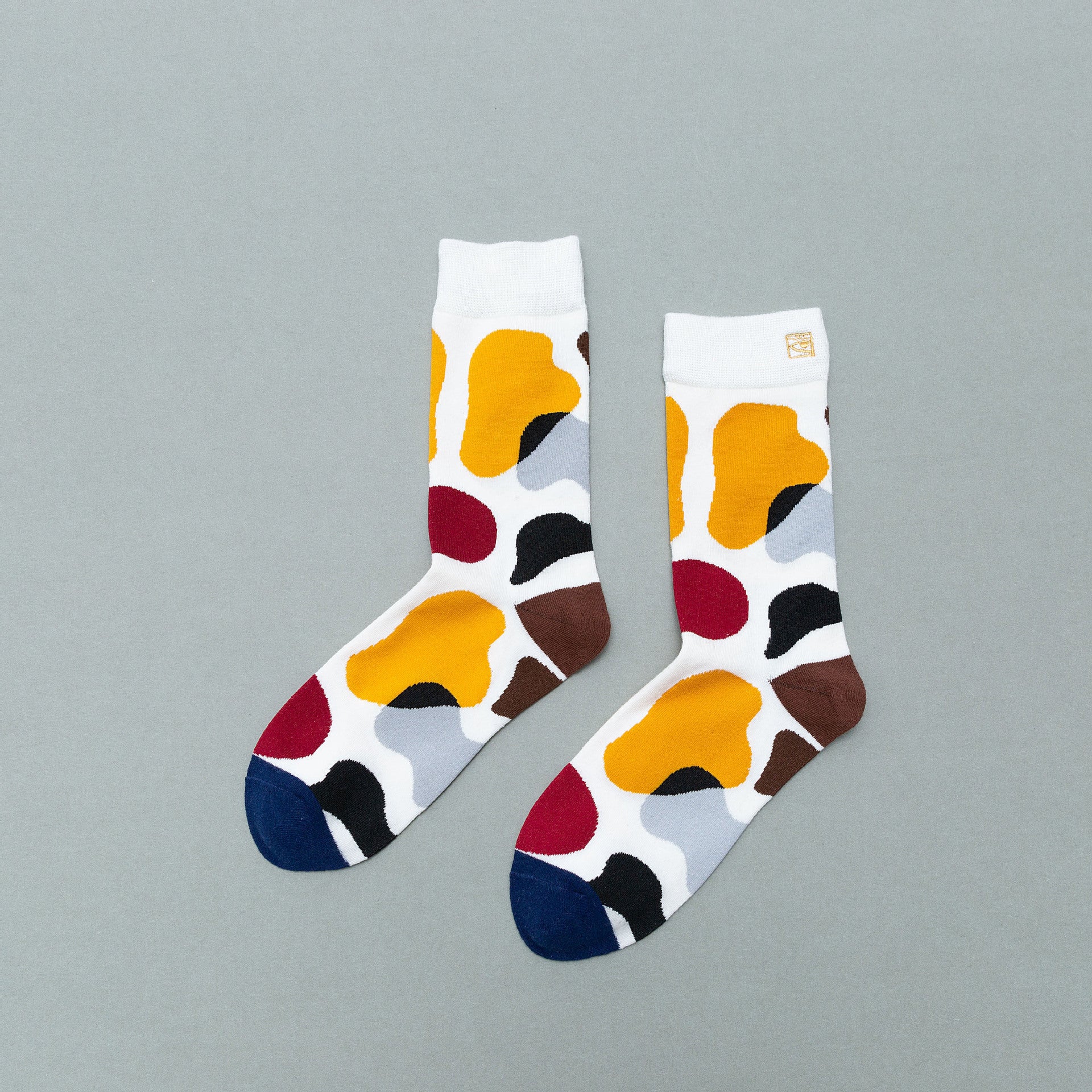 Personality contrast color graffiti character in tube socks Street style fashion cotton socks Limorista