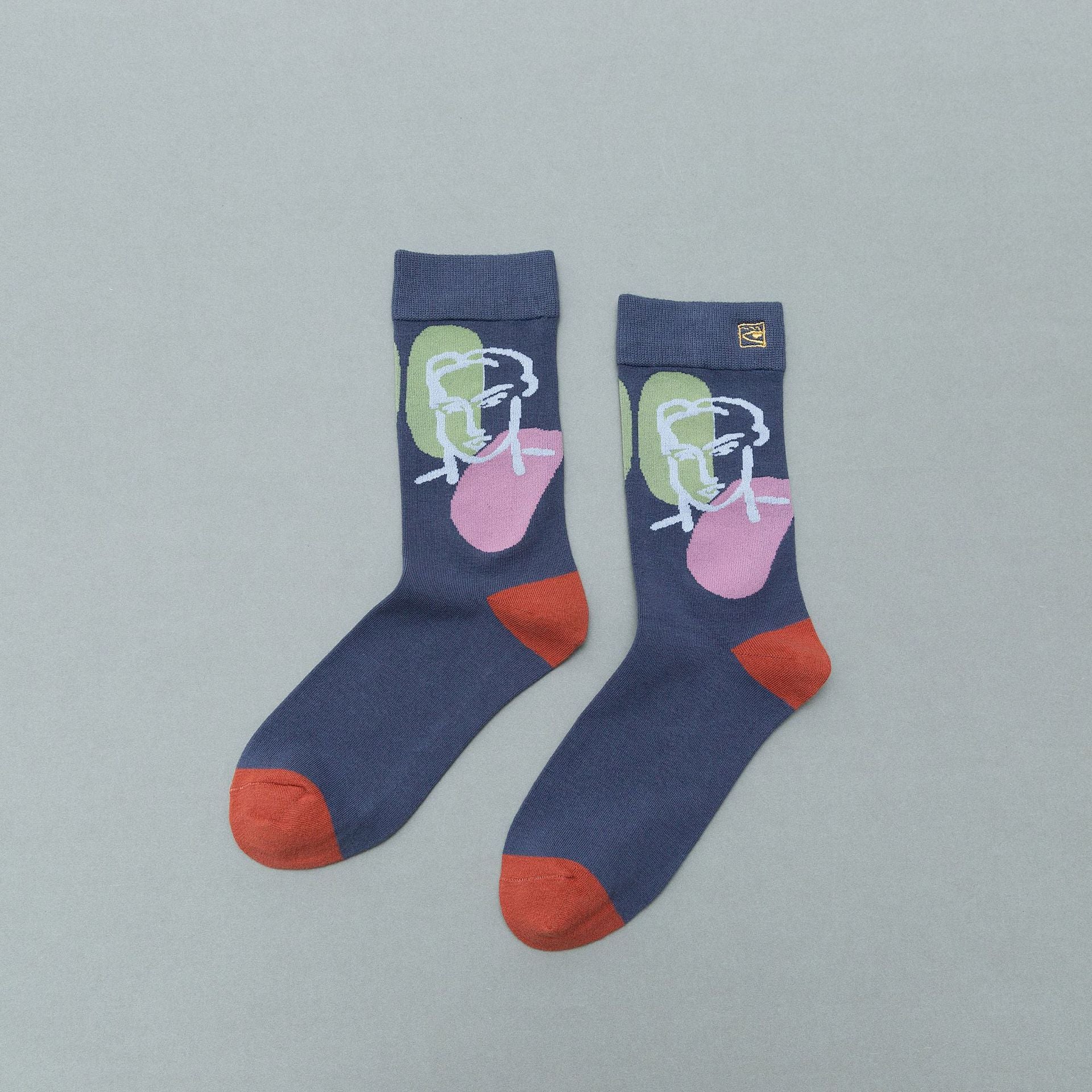 Personality contrast color graffiti character in tube socks Street style fashion cotton socks Limorista