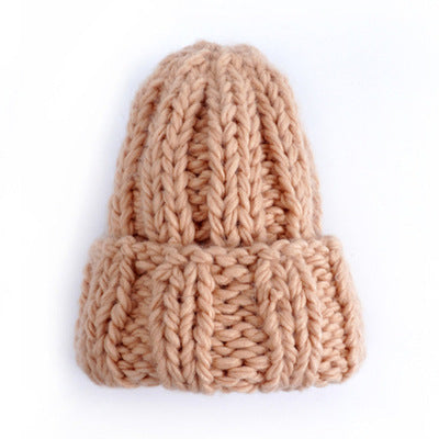 Europe and the United States new knit hat ladies autumn and winter fashion wild thick wool hat solid color simple earmuffs Limorista