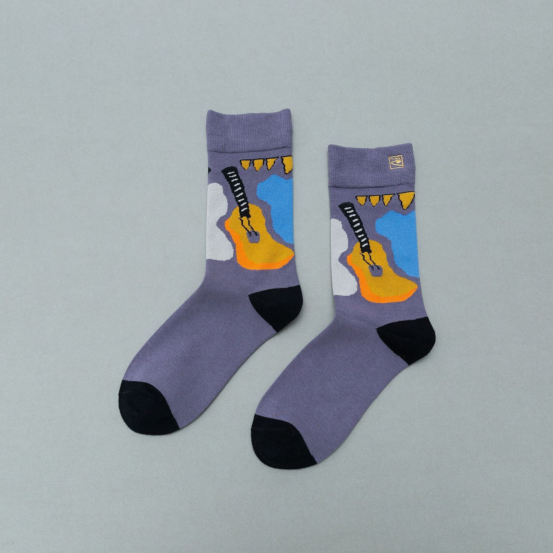 Personality contrast color graffiti character in tube socks Street style fashion cotton socks Limorista
