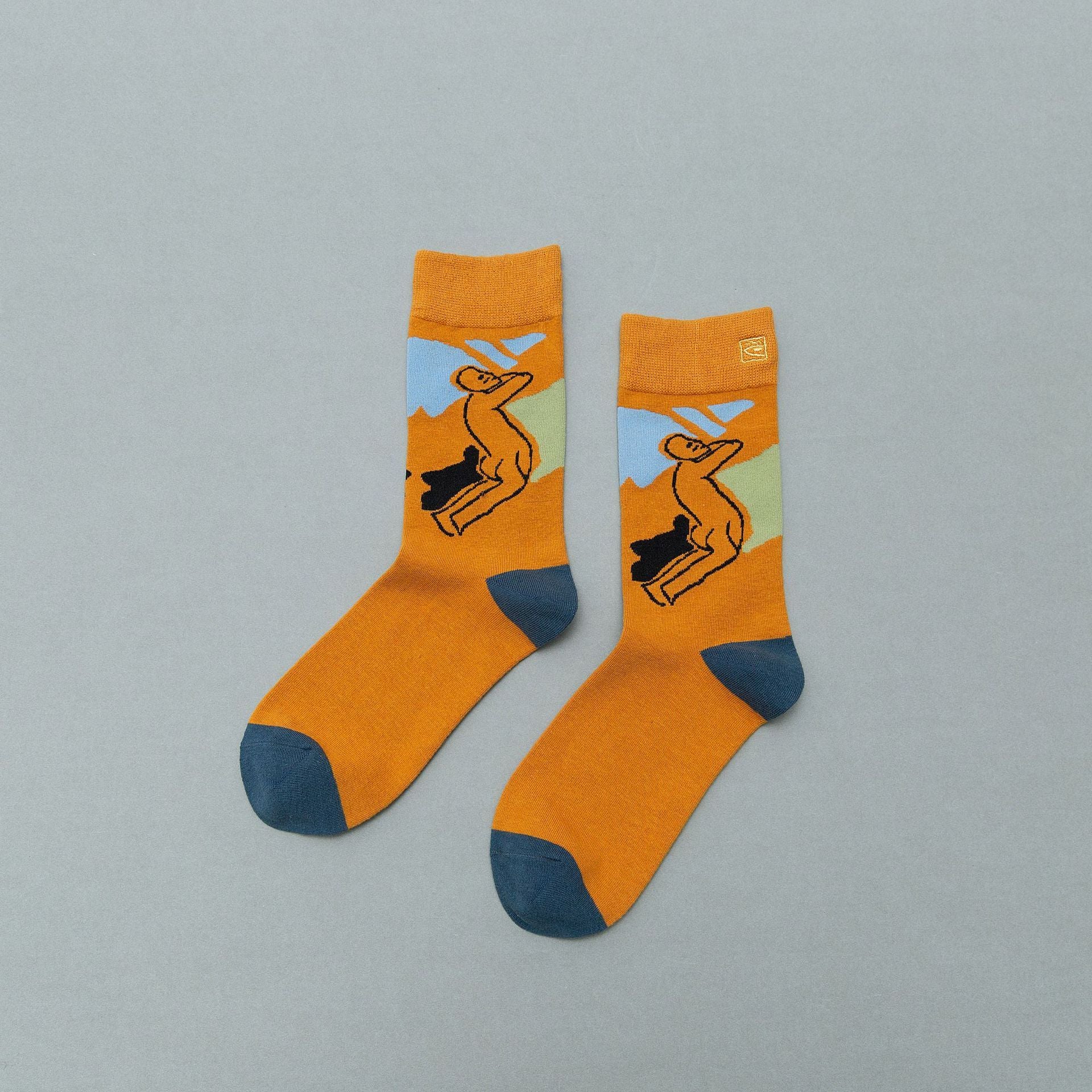 Personality contrast color graffiti character in tube socks Street style fashion cotton socks Limorista
