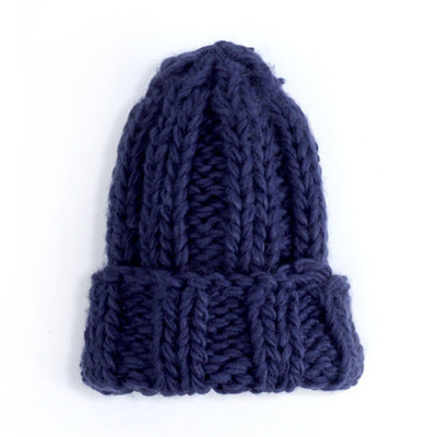 Europe and the United States new knit hat ladies autumn and winter fashion wild thick wool hat solid color simple earmuffs Limorista