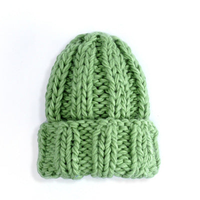 Europe and the United States new knit hat ladies autumn and winter fashion wild thick wool hat solid color simple earmuffs Limorista
