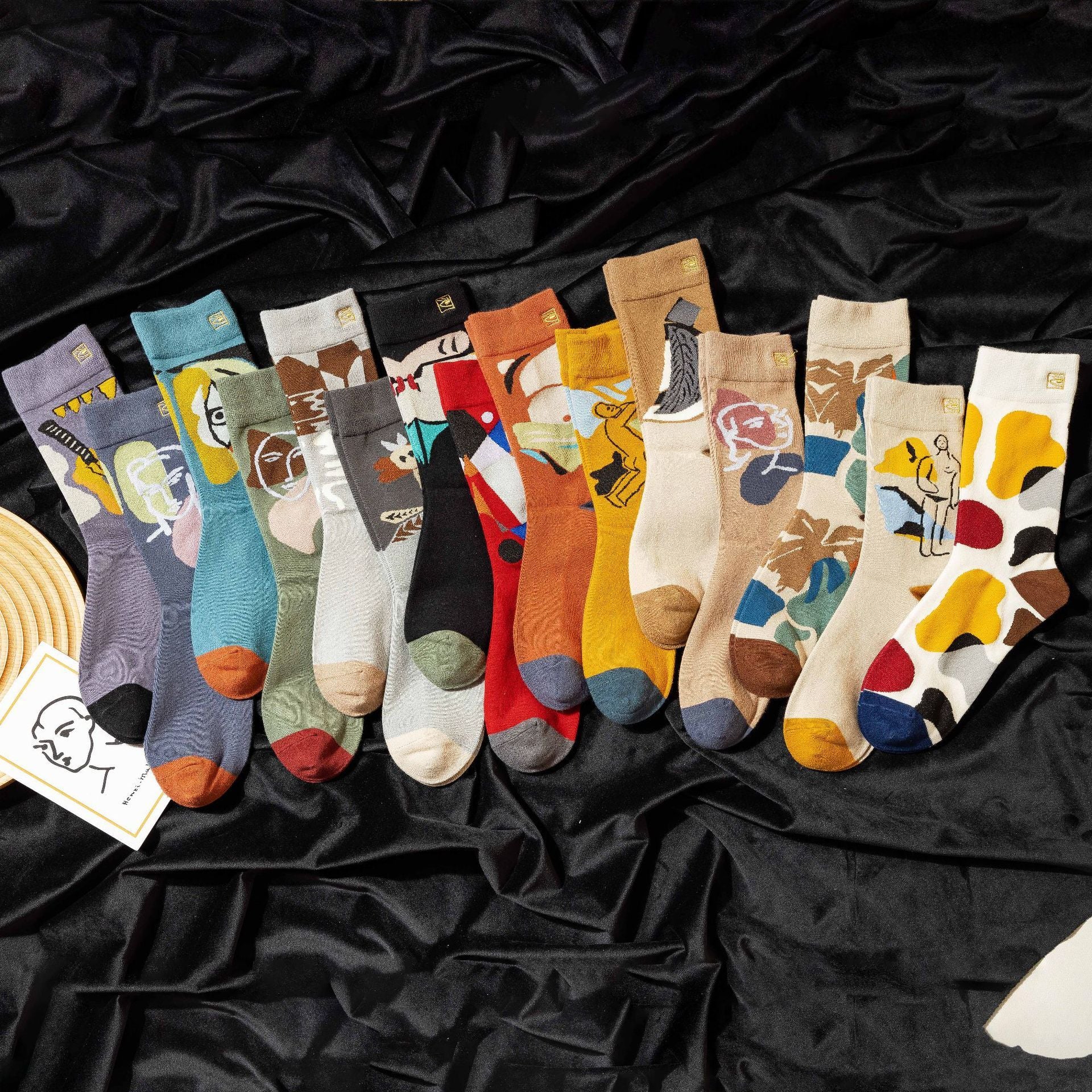 Personality contrast color graffiti character in tube socks Street style fashion cotton socks Limorista