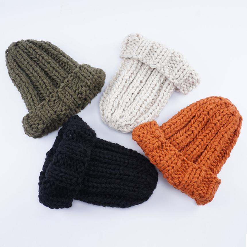 Europe and the United States new knit hat ladies autumn and winter fashion wild thick wool hat solid color simple earmuffs Limorista