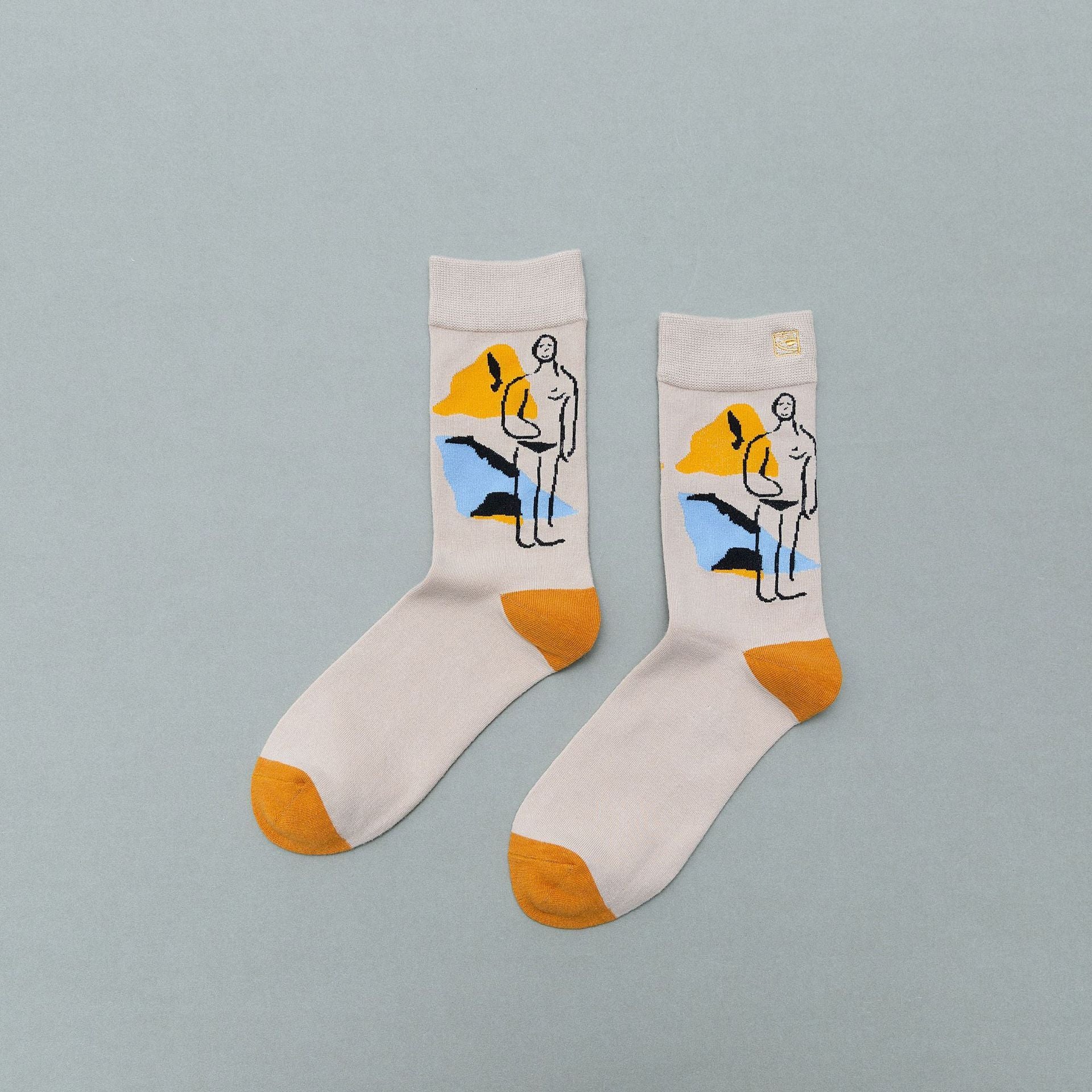 Personality contrast color graffiti character in tube socks Street style fashion cotton socks Limorista