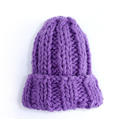 Europe and the United States new knit hat ladies autumn and winter fashion wild thick wool hat solid color simple earmuffs Limorista