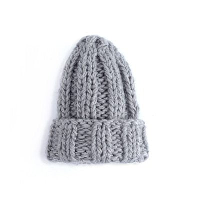 Europe and the United States new knit hat ladies autumn and winter fashion wild thick wool hat solid color simple earmuffs Limorista